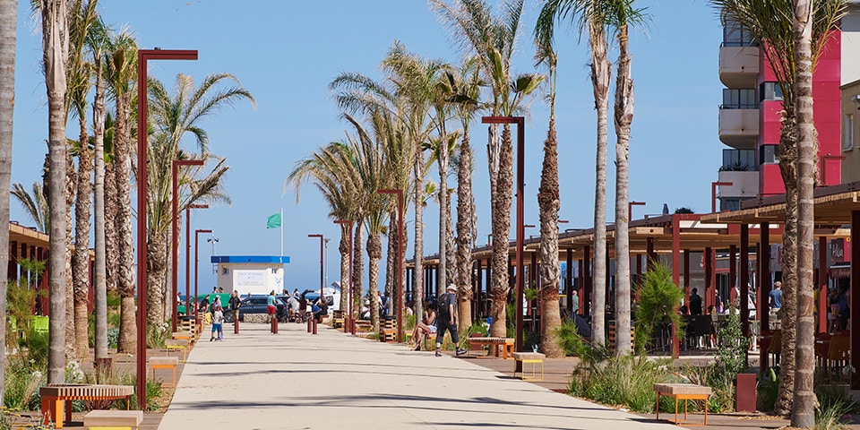 Mediterranean boulevard in Narbonne with red Shiraz K and Shiraz K Nano lampposts